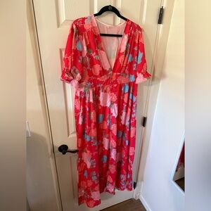 Floral V-neck button down pocket dress. Size XL. Worn once.